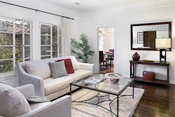 High-end real estate photography moderate size condo living room in West Los Angeles, CA. by Tom Hunter Photography